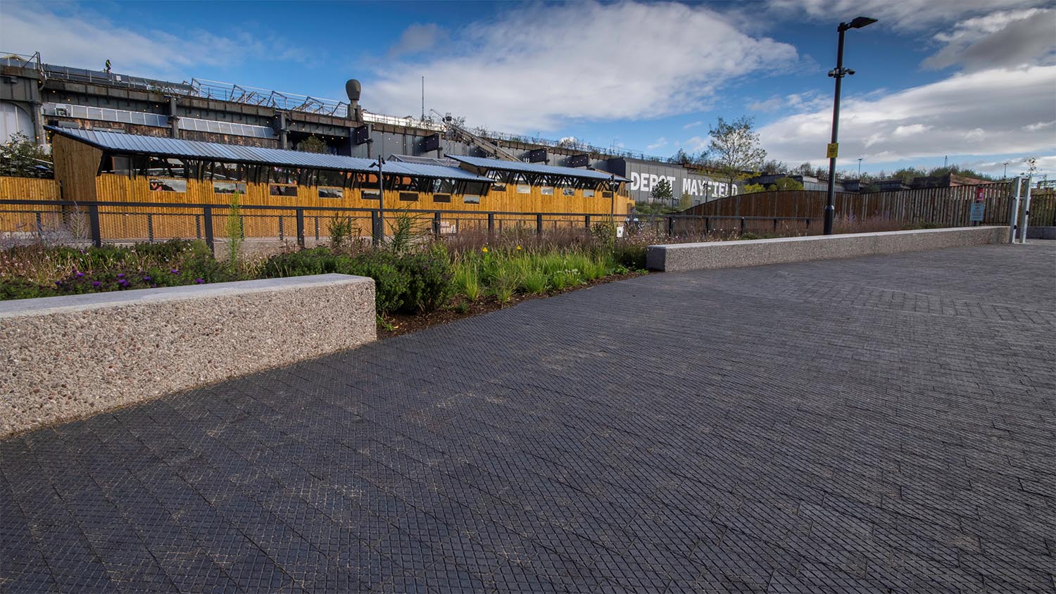 staffs blue diamond chequer pavers perfectly suited the industrial heritage of AJ Award winning Mayfield Park image by Hardscape
